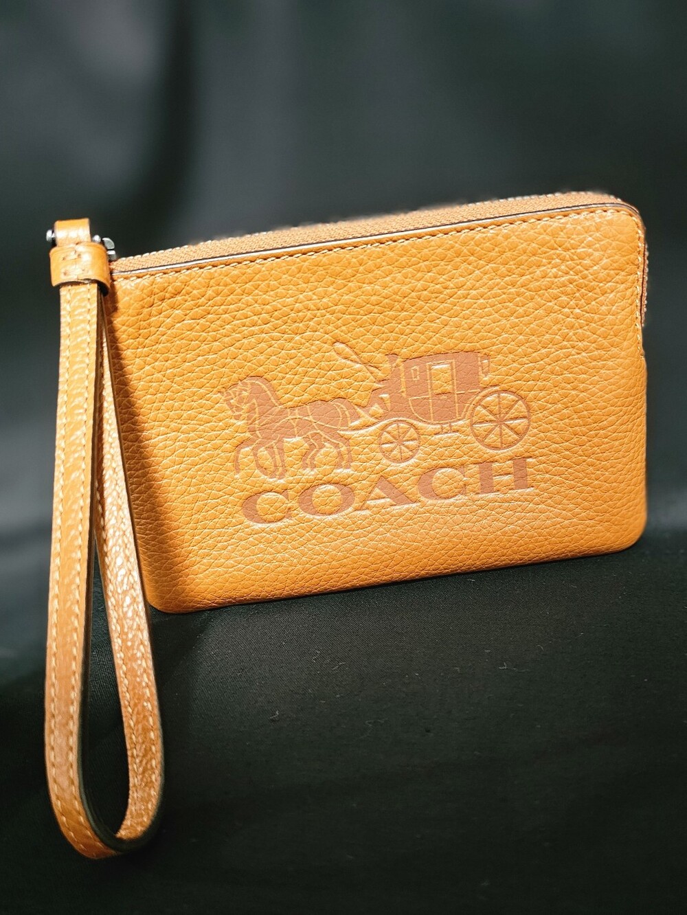 Coach Orange Leather Wristlet with Embossed Coach Logo
